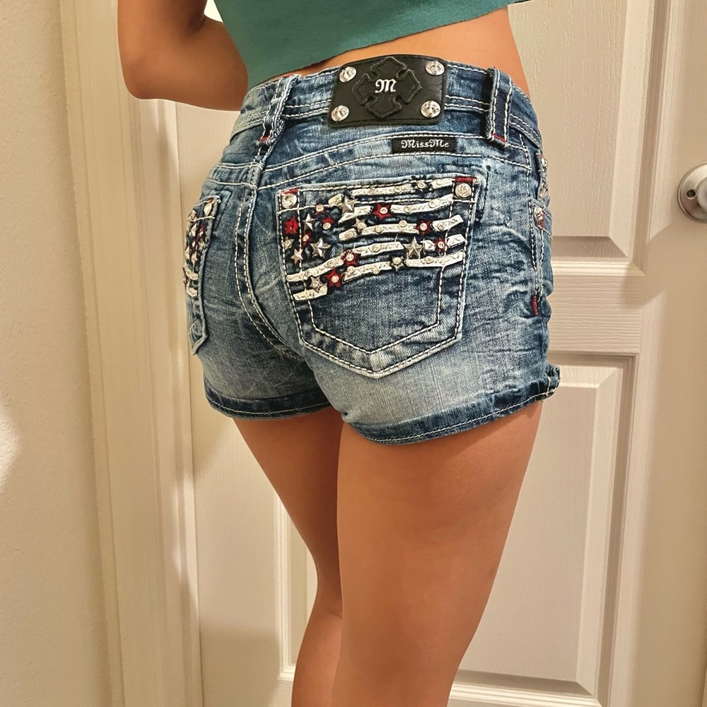 Miss Me Blue Distressed Denim Jean Shorts with Flag Pocket Embellishment